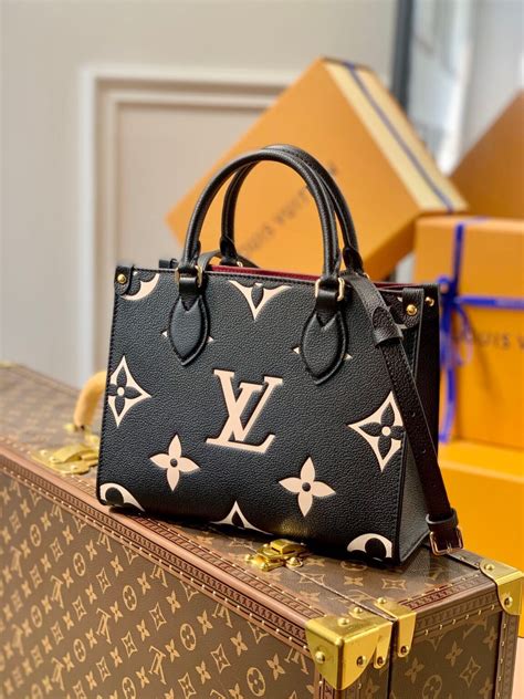 black and gold lv purse|louis vuitton large black tote.